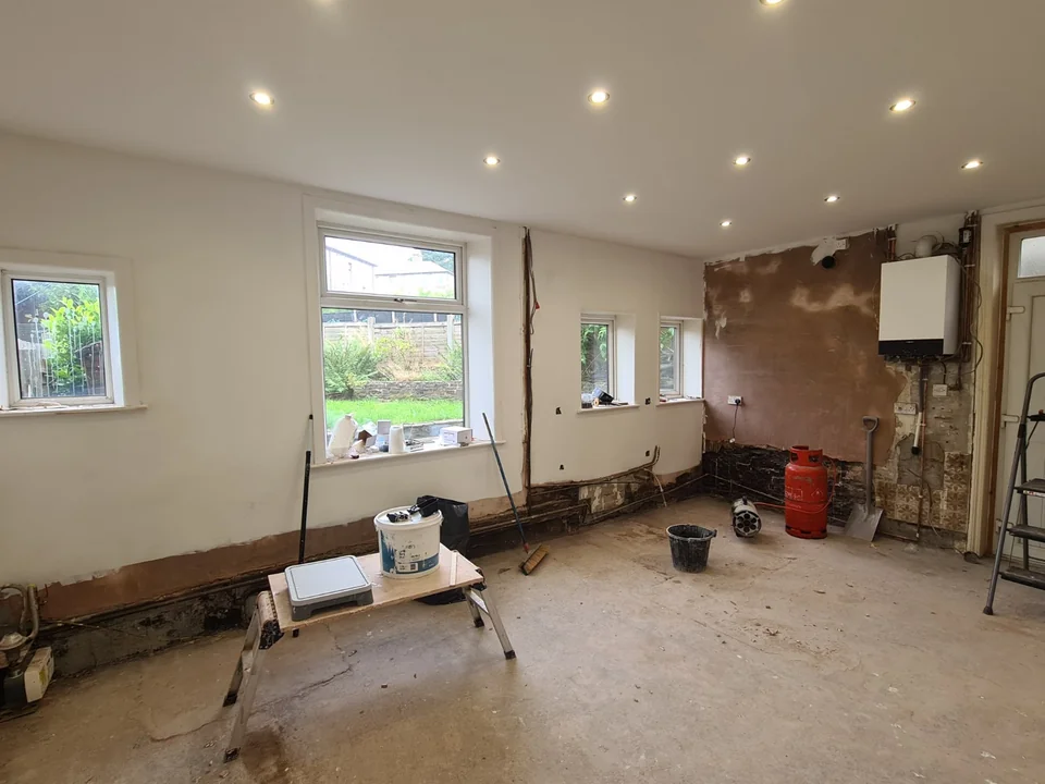 Wide view across the enlarged Rawtenstall kitchen during preparation and decoration.