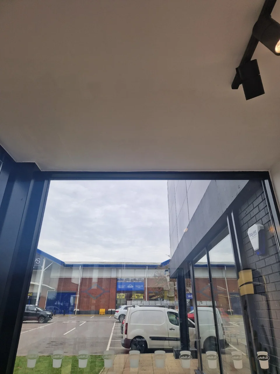 Closer view of the finished ceiling surface above the entrance glazing at Tim Hortons, Stockport.