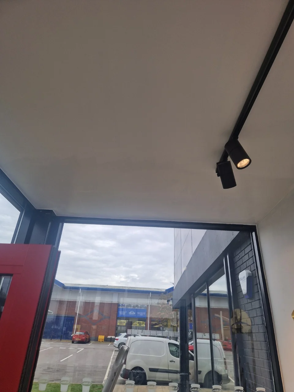 Wide view of the completed entrance ceiling repair at Tim Hortons in Stockport.